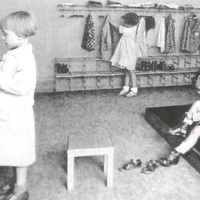 Cloackroom (group 2) with a bench to make it easier for the children to put on and take off their shoes [The Children's House on Rudolfsplatz, Vienna, 1930] -  T. Müller, R. Schneider, <em>Lehrmaterialien 1913-1935. Möbel und Architektur. Techning Meterials 1913-1935. Furniture and Architecture</em>, München, Prestel Verlag, 2002, p.71$$$395