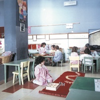 [Each one chooses an activity to engage in individually or in a small group, Casa dei Bambini on Viale Spartaco (Tuscolano district), 1980s, Rome] – ONM Archive.$$$510