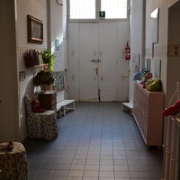 [Entrance and hallway of the Montessori Micronido run by the ONM in agreement with the Municipality of Rome, Via Nomentana 56, first decade of the 2000s] – ONM Archive.$$$521