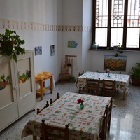 [Dining room prepared to foster independence and conviviality, Montessori Micronido run by the ONM in agreement with the Municipality of Rome, Via Nomentana 56, first decade of the 2000s] – ONM Archive.$$$522