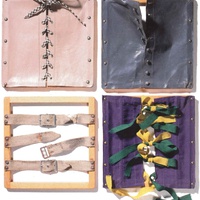 Children's first step towards looking after themselves independently is dressing and undressing. To help them learn to fasten and unfasten clothes and shoes, there are ten frames covered with different kinds of fabric and with different fastenings. Four of these frames are displayed [anni 20] - T. Müller, R. Schneider, <em>Lehrmaterialien 1913-1935. Möbel und Architektur. Techning Meterials 1913-1935. Furniture and Architecture</em>, München, Prestel Verlag, 2002, p.78$$$406