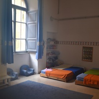 [Sleeping area prepared to promote rest and children’s independence, Montessori Micronido run by the ONM in agreement with the Municipality of Rome, Via Nomentana 56, first decade of the 2000s] – ONM Archive.$$$528